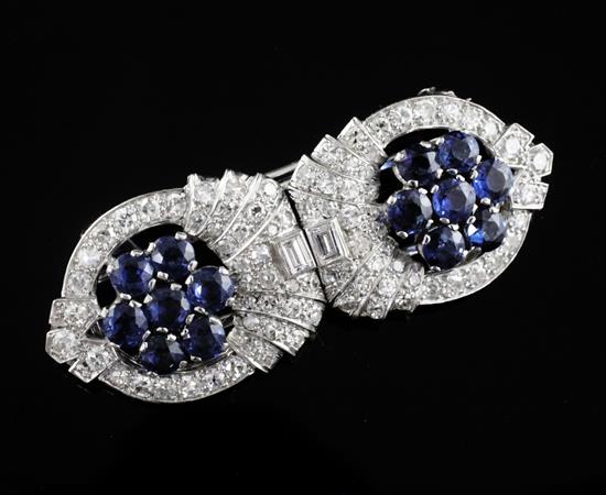 A 1960s? white gold, sapphire and diamond double clip brooch, 50mm.